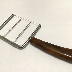 Vintage Stainless Steel Wire Cheese Slicer w Butterscotch Swirl Bakelite Handle